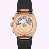 Close-up of the Frederique Constant Highlife Chronograph Automatic FC-391NS4NH4, showing its rose gold case, visible automatic chronograph movement with engravings, and black leather strap.