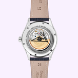 The back of the Frederique Constant Classics Runabout Automatic FC-303RMLN5B6 Limited Edition displays its detailed mechanical movement and engraved rotor through a clear case, highlighted by a leather strap—a testament to Frederique Constant’s craftsmanship.