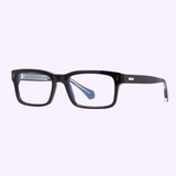 The Cartier CT0291O-001 54 Optical Frame by Cartier Optical features a rectangular black acetate design with clear lenses, silver temple accents, and slightly thick arms—modern luxury showcased on a light purple background.