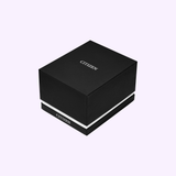 A black Citizen Watches branded gift box featuring a white stripe near the base is displayed on a light purple background—an ideal presentation for the Citizen Watches AW1840-50X Brycen (UPC 013205165979), which comes equipped with advanced Eco-Drive technology.