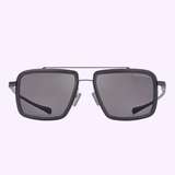 Dita Sunglasses DLS422-A-04 LSA-422 from Dita Sunglasses feature a rectangular black frame, dark polarized lenses, and a double bridge design, shown on a light purple background for striking contrast.