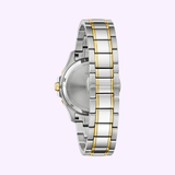 A close-up of the back of the Bulova Watches Marine Star 98P227 Ladies watch with a two-tone silver and gold bracelet, set against a light purple background.