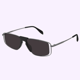 The Alexander McQueen AM0198S 004 sunglasses for men feature dark lenses and a slim metallic rectangular frame, shown on a white background with LEXOR MIAMI and Alexander McQueen Sunglasses logos—a sophisticated eyewear option.
