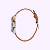 Side view of the Bulova Watches Chronograph A 98B427 Men, featuring a round silver case, brown leather strap, and two buttons—one orange and one black—set on a light purple background.