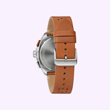 A brown leather strap with a silver buckle is attached to the stainless steel back of the Bulova Watches Chronograph A 98B427 men's watch, shown from the rear against a light purple background.