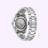 The Bulova Watches Surveyor 96B429 men's watch is displayed from the back, showcasing its transparent case back, visible mechanical movement, and a partially opened silver stainless steel bracelet.