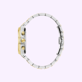 A side view of the Bulova Prestige 98B450 men's chronograph watch (UPC 042429603363) by Bulova Watches with gold and silver stainless steel accents, highlighting its thin profile and linked bracelet against a light purple background.