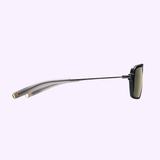 Side view of Dita Sunglasses DLS404-56-02-A LSA-404 with thin metal arms, clear curved plastic temple tips, and high contrast polarized lenses, displayed against a light lavender background.