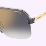 Carrera Sunglasses CARRERA 1066/S (UPC 716736983059) with gold arms, gray bridge, and Carrera logo on lens. Displayed on white with Lexor Miami branding above and Carrera Eyewear Since 1956 logo below. detail