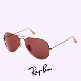 Ray-Ban RB3025 167/2K 55 Unisex Sunglasses feature brown-tinted lenses, thin metal frames, and the Ray-Ban logo on the lens. Stylish Ray-Ban sunglasses for any look. The Lexor Miami logo is shown at the top.