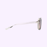 Side view of Dita Sunglasses DUBSIGNAL DTS465-A-03 Unisex (UPC 0810121956724) by Dita Sunglasses, with a metal frame, thin silver temples, and curved earpiece, shown on a light purple background.