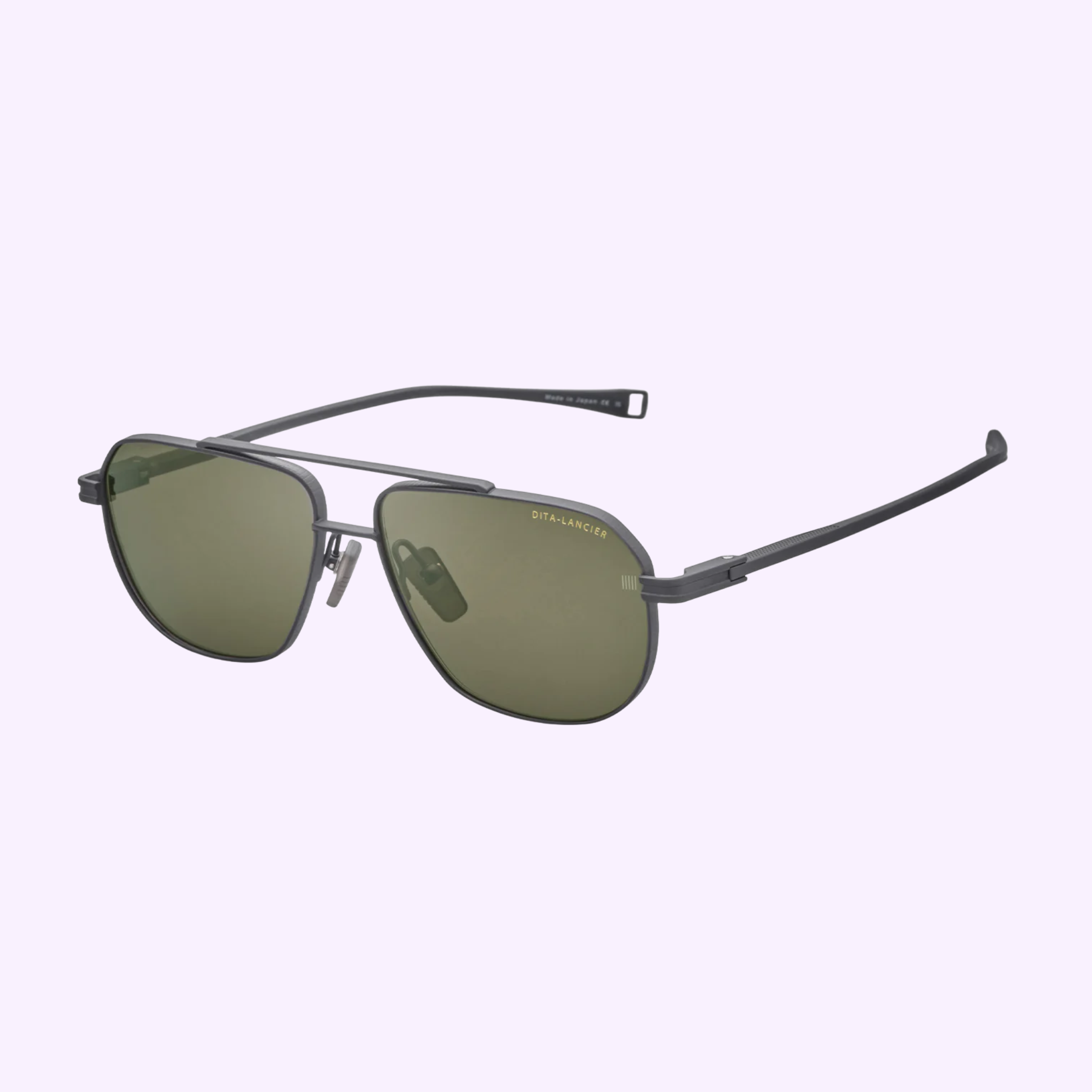 The Dita Sunglasses DLS424-A-03 LSA-424 by Dita Sunglasses feature sleek black metal frames and green polarized lenses for high contrast vision, shown on a light purple background.