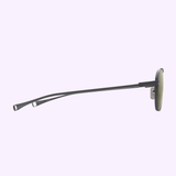 Side view of Dita Sunglasses DLS424-A-03 LSA-424 by Dita Sunglasses, featuring thin dark frames and green polarized lenses for high contrast, set against a light purple background.