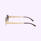Side Profile of Tory Burch TY6116 33461A Women's Oval Sunglasses Shiny Light Gold