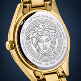 The back of the Versace VE6A00623 V-Code Watch by Versace Watches features an engraved face encircled by a Greek key pattern and detailed inscriptions about its materials and specifications, exemplifying the refined craftsmanship and elegance of a Swiss-made luxury timepiece.