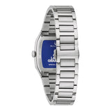 A Bulova Watches Millennia 96A336 silver stainless steel watch with a rectangular face is shown from the back, featuring a blue backplate with white text, dolphin graphic, and an open bracelet band—classic Miami style.
