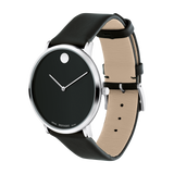 The Movado 0607262 Lexor Miami men’s watch by Movado Watches features a black leather strap, silver case, and black dial with two hands and a silver dot at 12 o’clock, powered by Swiss quartz movement.
