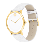 The Movado 0607508 Modern 47 by Movado Watches pairs a gold case and simple dial with a signature gold dot at 12 o’clock with a white textured leather strap—an elegant unisex watch for those seeking minimalist style.