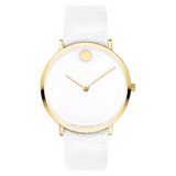 The Movado 0607508 Modern 47 features a white leather strap, gold-tone case, minimalist gold hands, and a raised gold dot at 12 o’clock on a sleek white dial—a stylish unisex watch from Movado Watches.