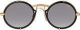 Cazal 644 C001 53 Unisex Sunglasses by Cazal Sunglasses feature round black frames with gold accents, gray tinted lenses, a double bridge, and transparent nose pads. The “Cazal” logo in gold is on the upper right lens. Stylish designer eyewear.