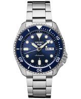 The Seiko SRPD51 Automatic 5 Sports men's watch by Seiko Watches features a 42.5mm stainless steel bracelet, blue bezel and dial, luminous markers and hands, plus day/date display at 3 o’clock. Available at Lexor Miami.
