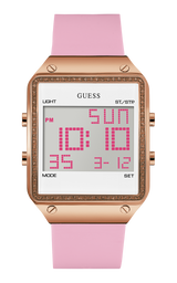 The Guess U0700L2 FLARE Women’s Watch by Guess Watches features a square rose gold case, pink silicone band, and pink digital display showing 10:10 and Sunday March 12, with convenient function buttons on the sides.