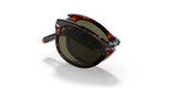 Folded Persol Sunglasses PO0714SM 24/P1 54 Unisex with brown tortoiseshell frame and dark lenses, shown on a white background. The arms are neatly folded, displaying the signature metal hinges of these iconic sunglasses.