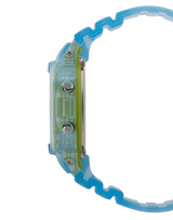 Side view of the G-Shock Watches DW5600LS-2 Vibrant Skeleton Blue Resin Strap Unisex Watch, showing its translucent green case and three metallic buttons, set against a plain white background.