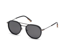 The Ermenegildo Zegna Sunglasses EZ0127S feature black, round lenses, thin metal frames, and straight temples—an elegant accessory reflecting the luxury menswear heritage of Ermenegildo Zegna Sunglasses.