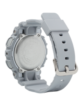 A close-up of the back of a G-Shock GMAS120MF-8A S Series Analog Digital Women’s Watch by G-Shock Watches, featuring a grey resin strap and stainless steel case back, secured with a silver buckle.