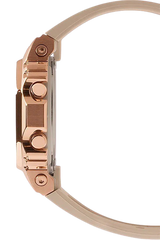 Side view of the G-Shock GM-S5600PG-4 Women Watches Lexor Miami by G-Shock Watches, featuring a beige strap and rose gold case, highlighting its buttons and design against a white background—ideal for women watch enthusiasts.