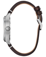 A side view of the Citizen BM6838-09X Garrison Eco-Drive men’s watch by Citizen Watches, featuring a silver metal case, brown leather strap, visible crown, and buckle fastening.
