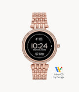 The Michael Kors MKT5128 Darci Gen 5E Rose Gold Stainless Steel Strap Women Smart Watch by Michael Kors Watches displays the time, steps, heart rate, and notifications. The Wear OS by Google logo appears in the bottom right corner.