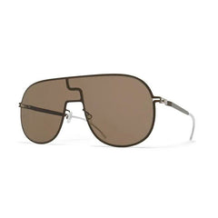 The Mykita Studio12.1 Sepia Unisex Sunglasses by Mykita Sunglasses feature a brown-tinted, oversized single lens, a distinct cut-out bridge, lightweight stainless steel frame, and white temple tips.
