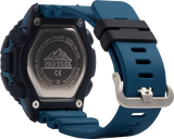 The back of a G-Shock PRTB70-2 Pro Trek Quad Sensor Blue Resin Strap Men's Watch displays a stainless steel case engraved with the Pro Trek logo, mountain graphic, and product info—ideal for those wanting a fishing timer watch.