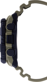 Side view of a rugged G-Shock PRTB70-5 Pro Trek Tan Resin Strap Men Watch by G-Shock Watches, featuring a green and black case, three textured buttons, and a green contoured strap on a white background.