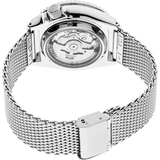 A close-up of the Seiko Watches SRPE75 5 Series men's watch features a silver stainless steel mesh strap, transparent case back, and visible mechanical movement.