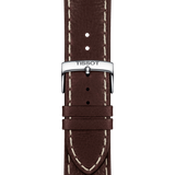 Close-up of the brown leather strap with white stitching and a silver Tissot-engraved buckle, designed for the Tissot T1016171603100 PR 100 Sport Gent Chronograph Men’s Watch by Tissot Watches, shown on a plain white background.