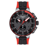 The Tissot T1114172744100 T-Race Cycling Chronograph features a black-red silicone strap, black dial with three subdials, white markers, red tachymeter bezel, silver and red accents, and “TISSOT 1853” on the face.