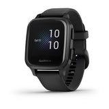 The Garmin Watches 010-02430-00 Venu®SQ Music Edition unisex smartwatch features a square face, displays 10:10 and Sat 01, and comes with a textured black silicone strap. It's shown from a slight angle.