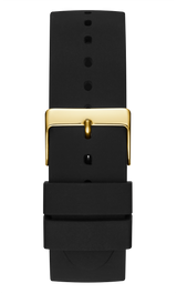 Matte black silicone strap for Guess U1161G1 IMPRINT men’s watch by Guess Watches, featuring a gold rectangular buckle, multiple adjustment holes, and two keepers; shown on a plain white background.
