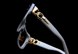 A close-up of Balmain BPS-106B-150 Armour Unisex Sunglasses highlights the sleek design and luxury finish of these designer frames from Balmain Sunglasses.