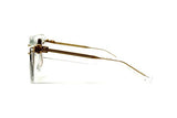 Side view of Balmain BPS-100D-56 B-I Unisex Sunglasses with clear frames and gold metal arms, by Balmain Sunglasses, photographed against a white background.