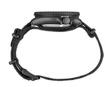 Side view of the Seiko SRPD79 Automatic Black Nylon Strap Men Watches by Seiko Watches, featuring a textured bezel and a black nylon strap, displayed horizontally with the strap unclasped in a circular layout.