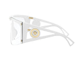 Versace 0VE4393 401/1W46 Unisex Sunglasses by Versace Sunglasses feature a white geometric cutout frame, wide temple arms with a gold Medusa emblem, and clear lenses for an authentic, bold statement look.